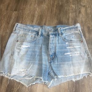 American Eagle Outfitters distressed light denim shorts.